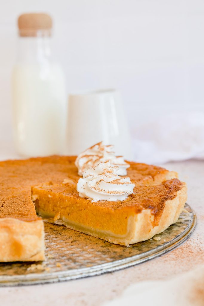 A homemade pie with a crispy crust and creamy sweet potato filling.