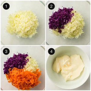 Shredded cabbage and carrots tossed in a large bowl