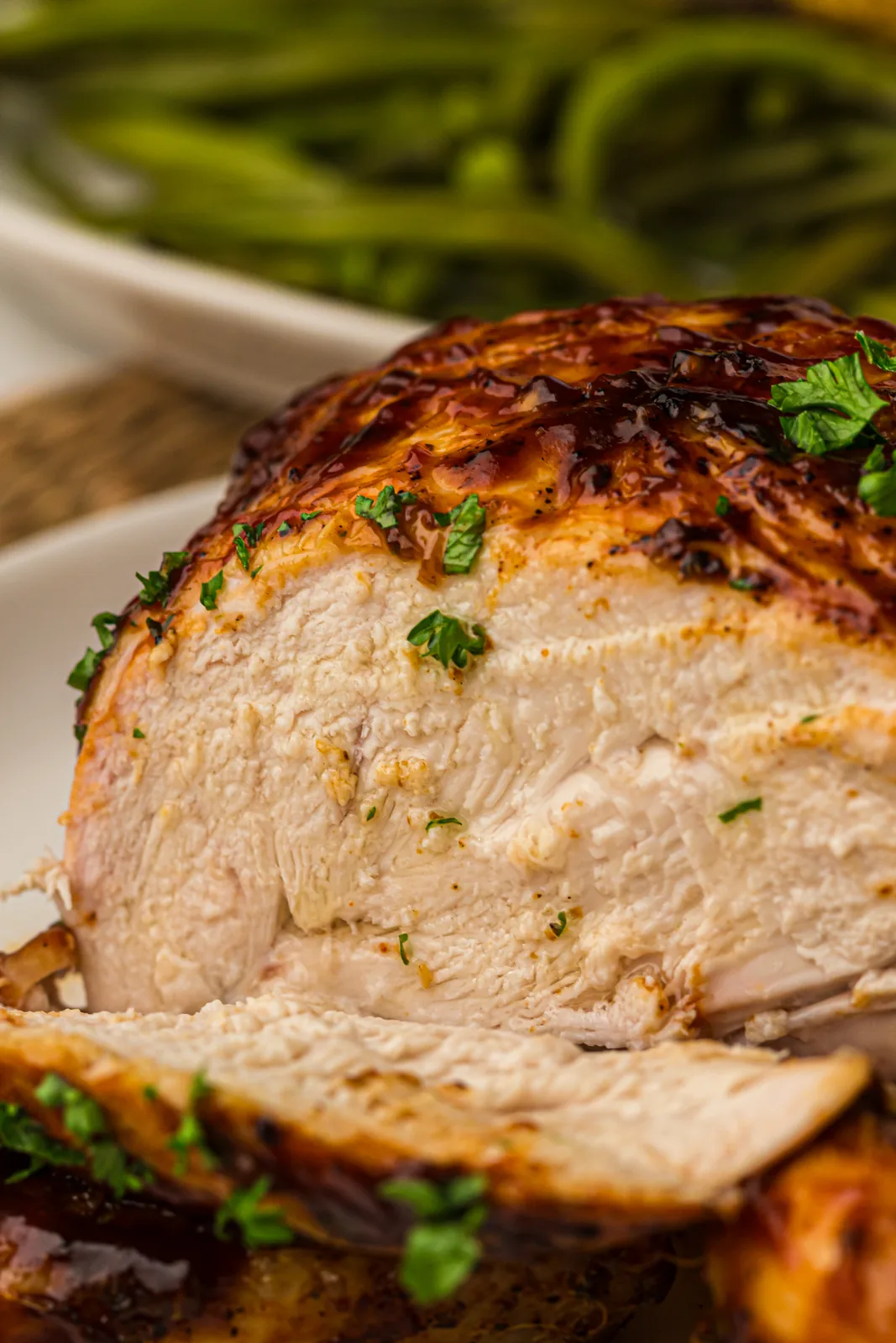 Close up of crispy, charred, golden seasoned skin