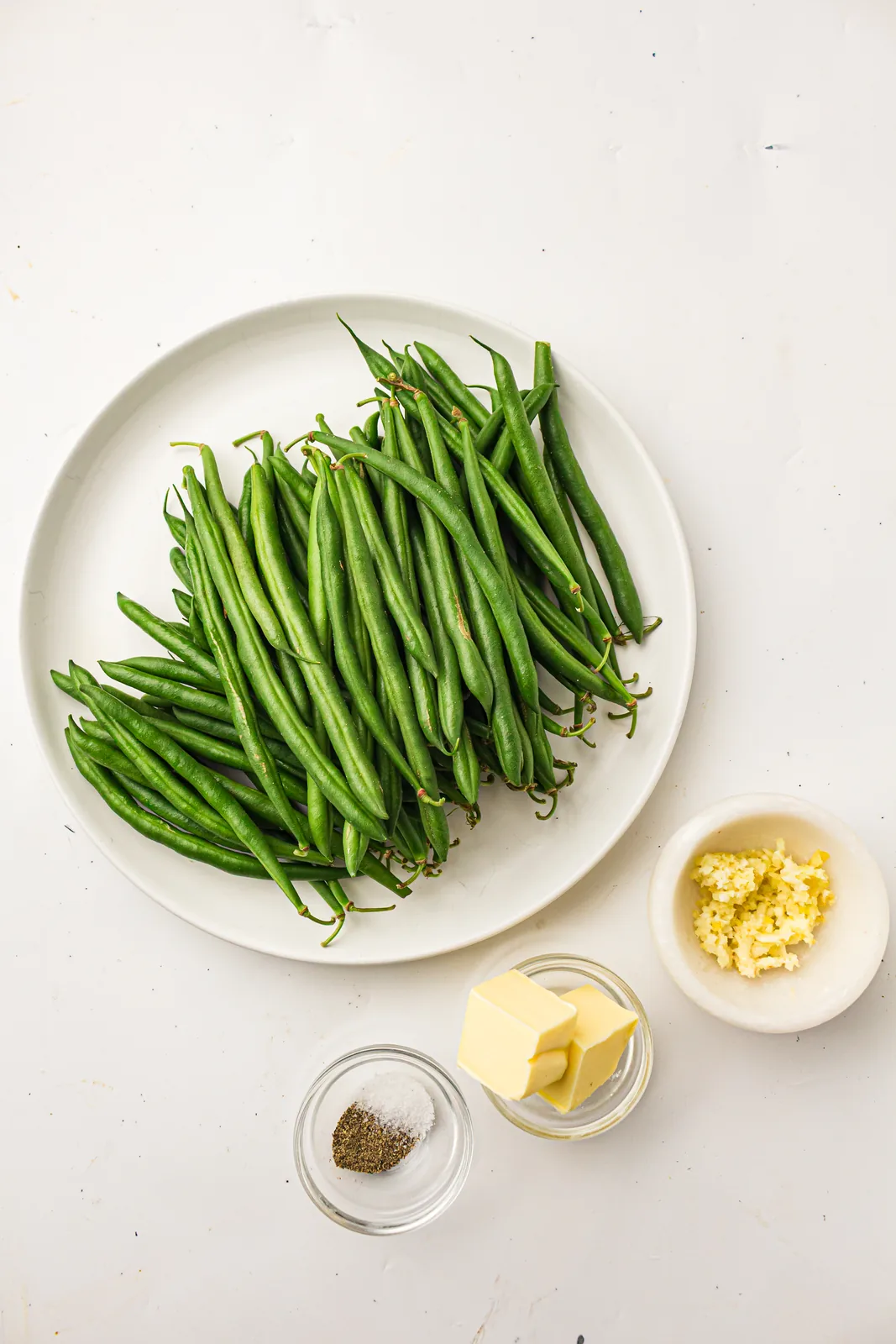 Ingredients for garlic butter green beans: green beans, butter, garlic, salt, and pepper