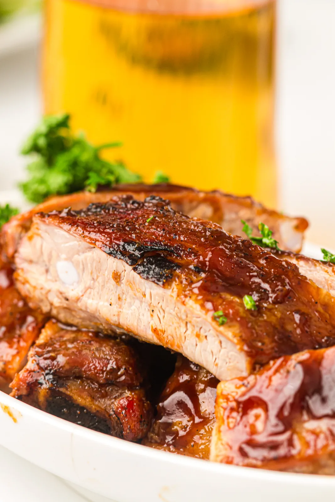 Glazed grilled ribs sliced to show the juicy, tender interior