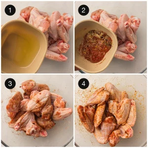 Tossing raw party wings with oil and a paprika spice rub