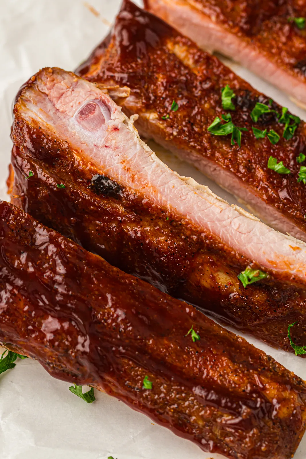 A glazed rack sliced between the bones on parchment
