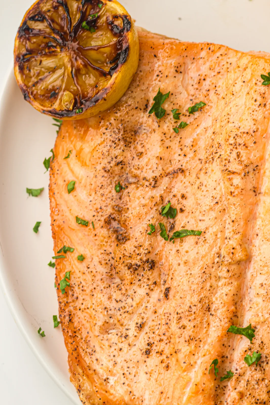 Flaky, tender fish garnished with fresh parsley