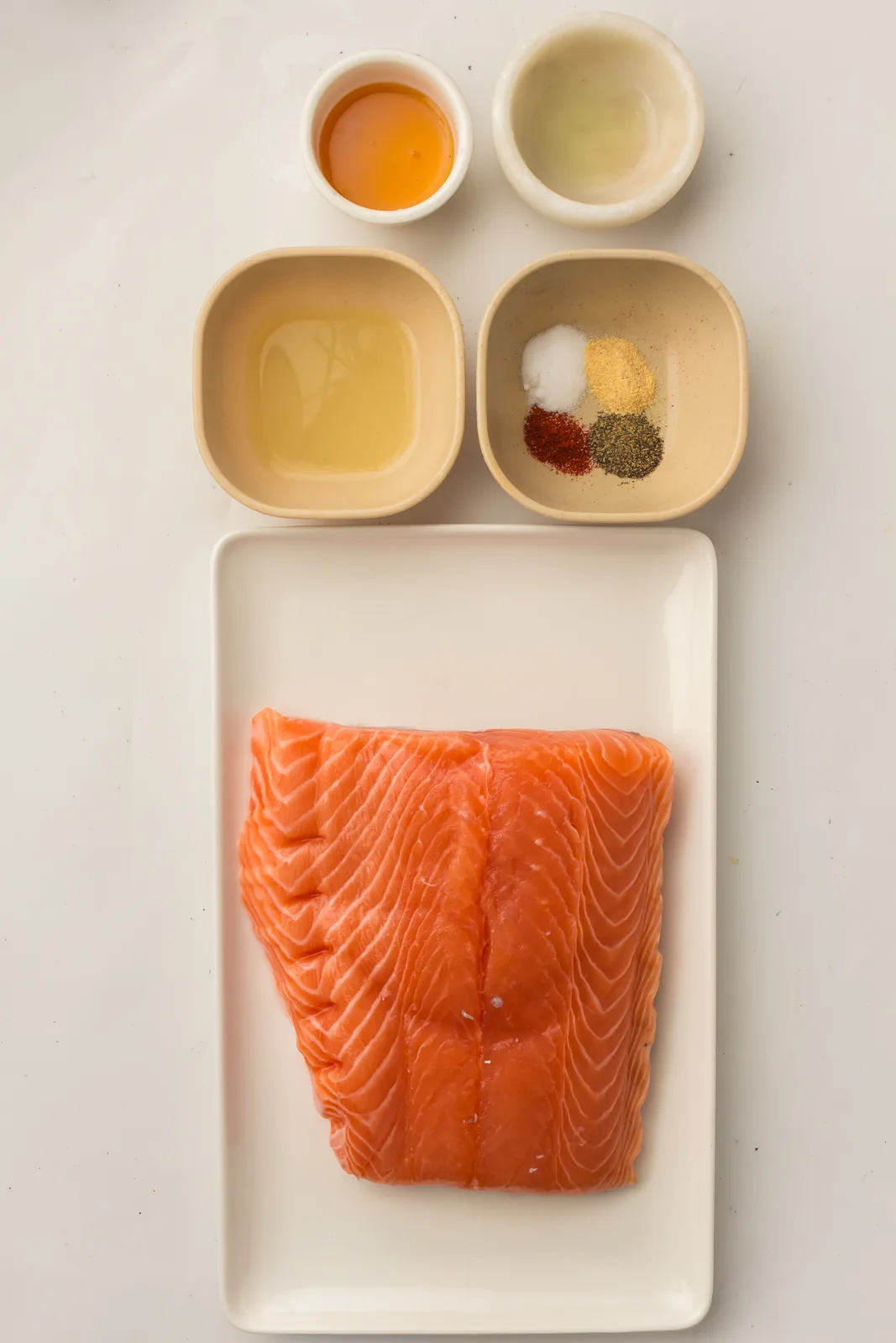 Ingredients for smoked salmon including honey, lemon and spices