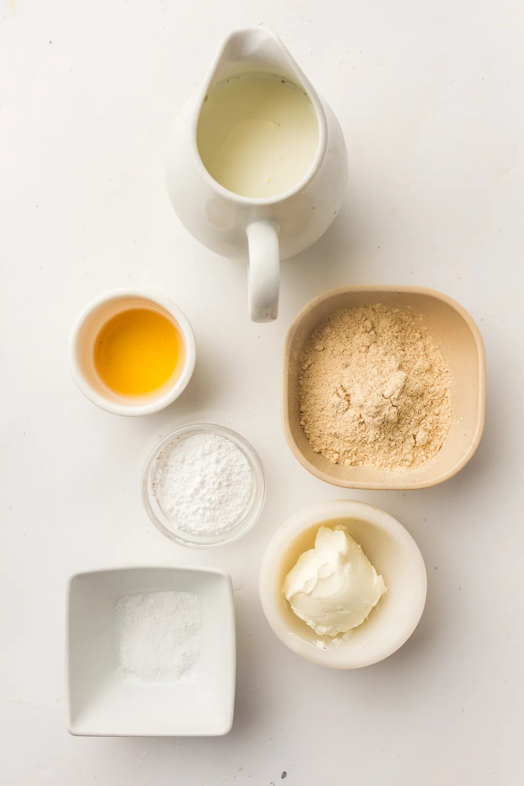 Ingredients for protein ice cream: milk, cream cheese, protein powder, and sweetener