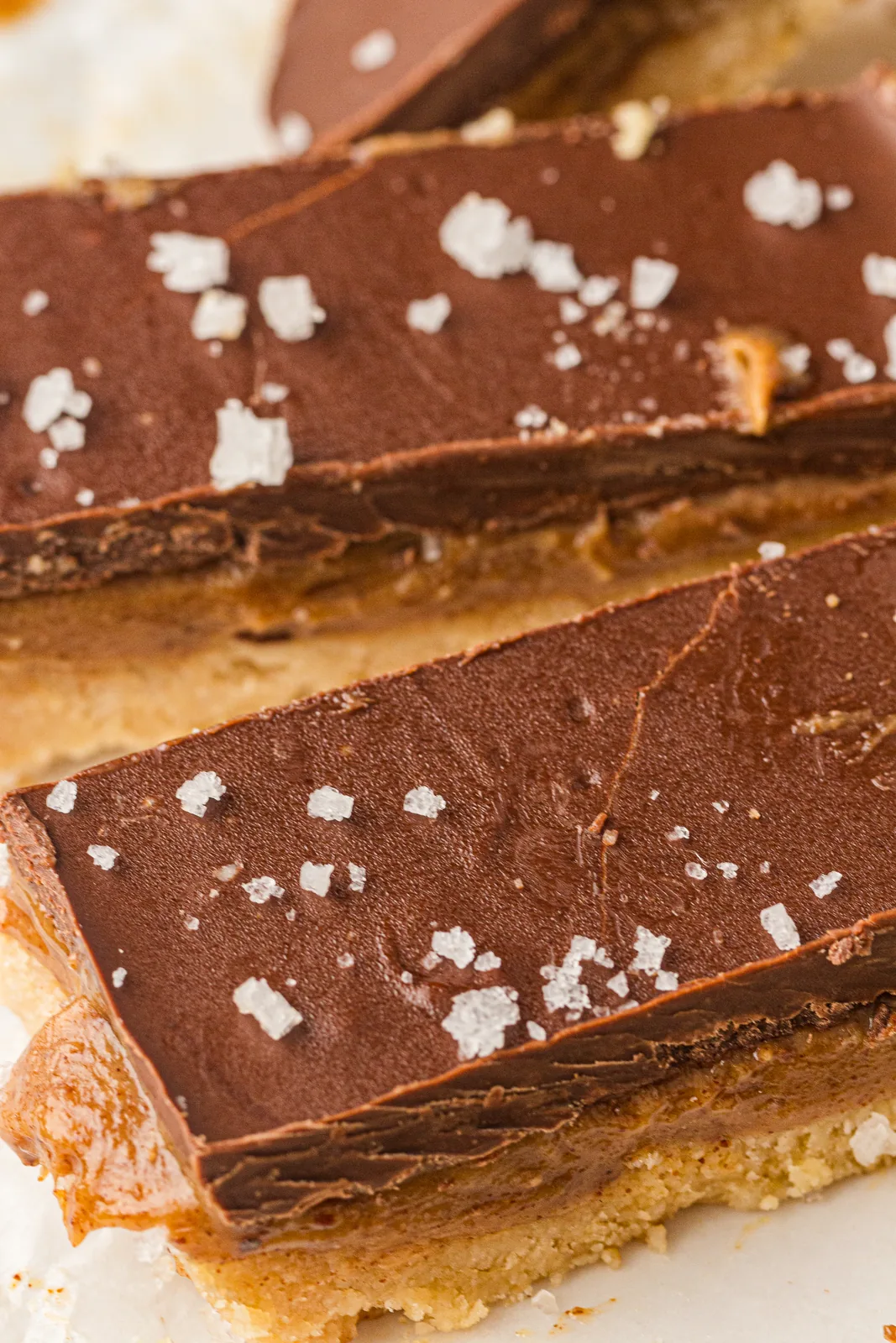 Stacked layered slices topped with flaky salt