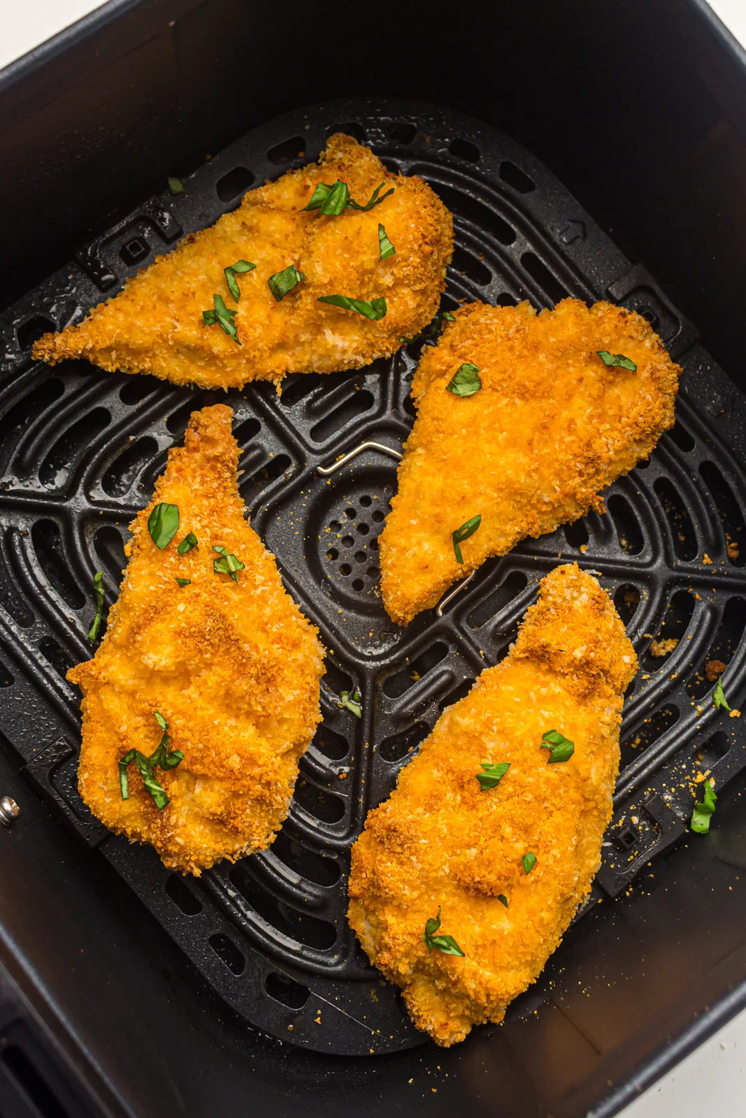 Sliced crisp cutlet showing the white meat inside