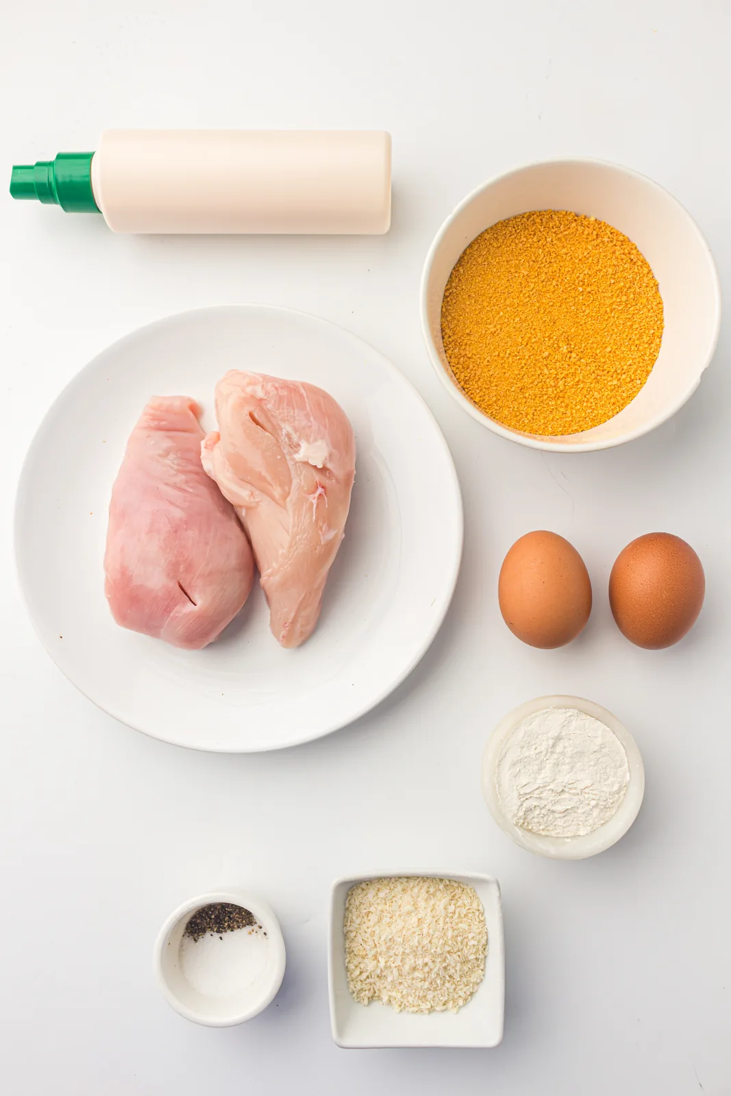 Ingredients for air fryer chicken cutlets: chicken, panko, eggs, flour and seasoning