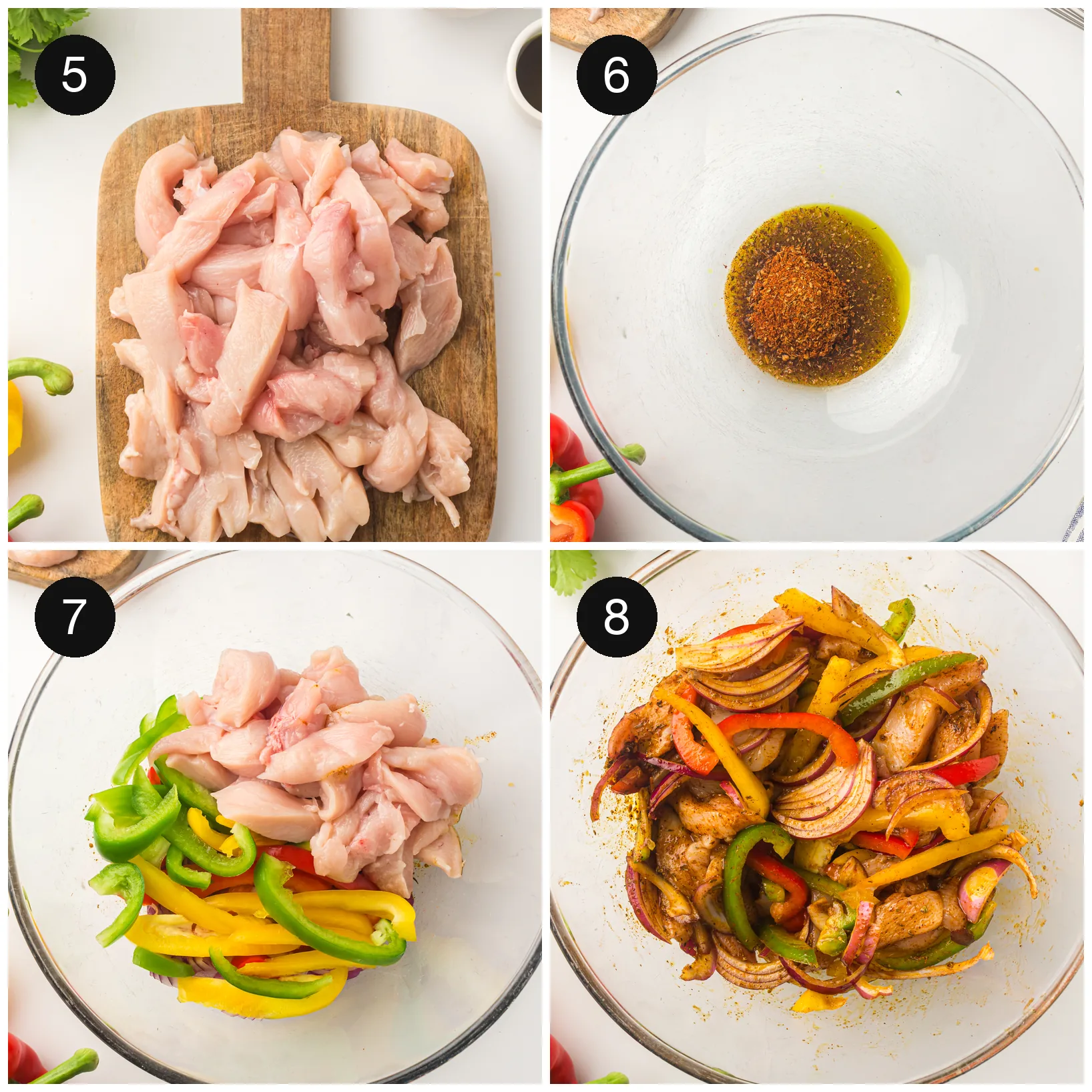 Sliced peppers, onion and chicken tossed in seasoning in a large bowl