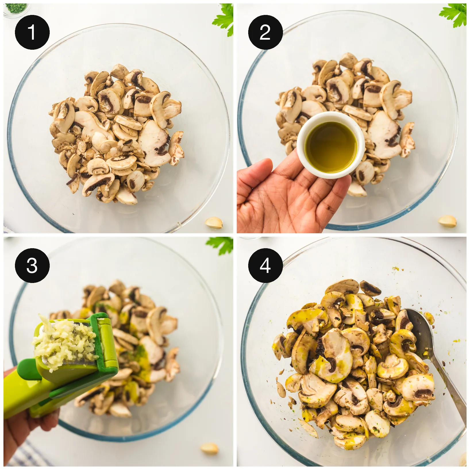Sliced mushrooms tossed with oil and garlic in a mixing bowl