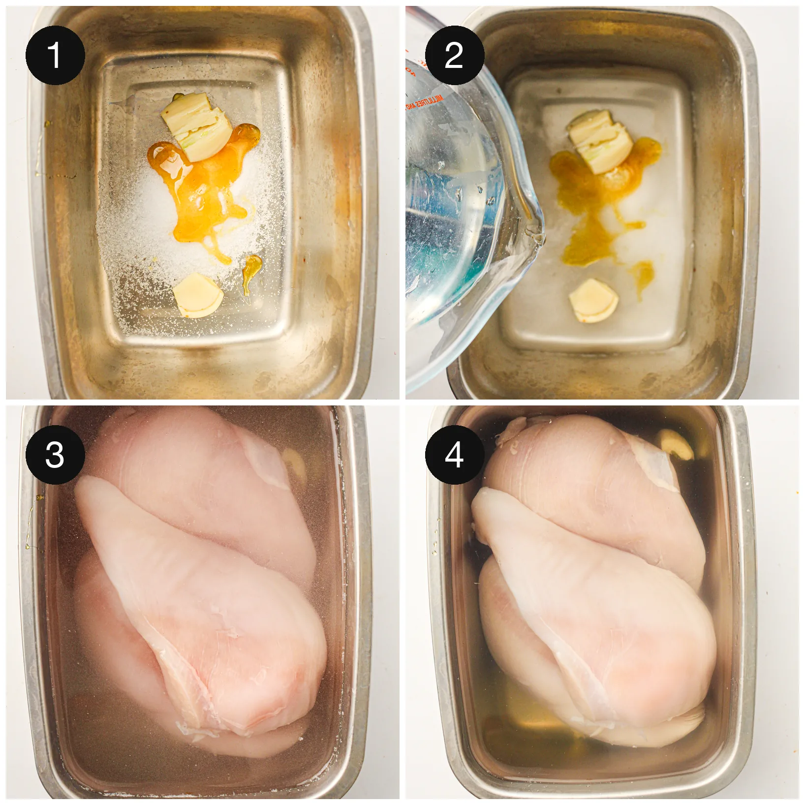 Raw chicken breasts submerged in a salty brine with crushed garlic