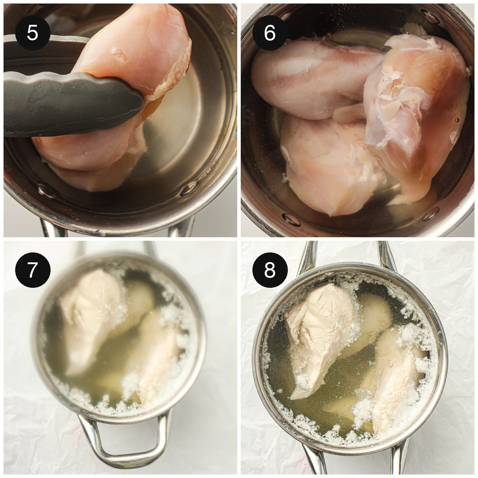 Chicken breasts poaching gently in a pan of barely simmering water