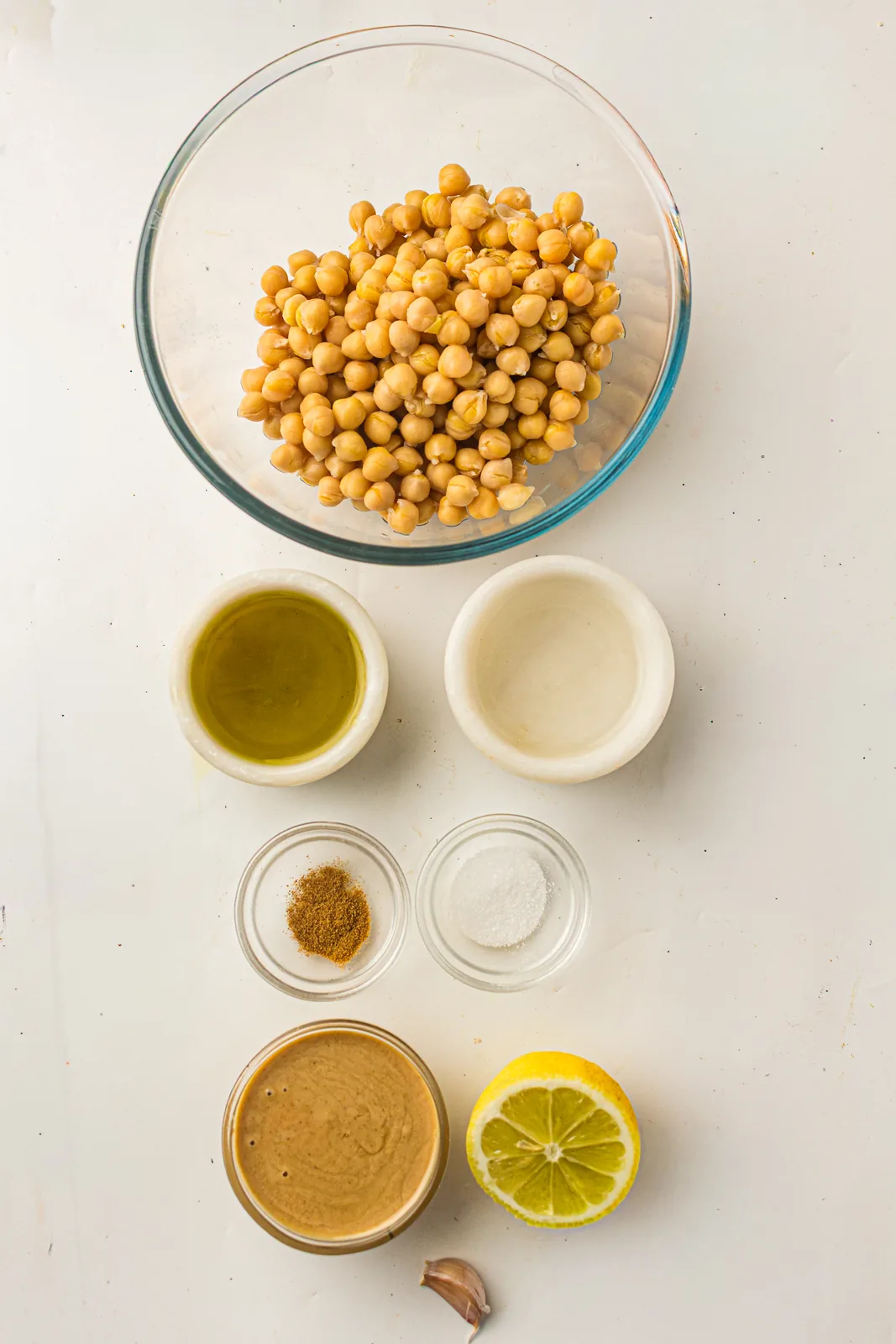Ingredients for hummus: chickpeas, tahini, lemon, garlic, olive oil, salt and cumin