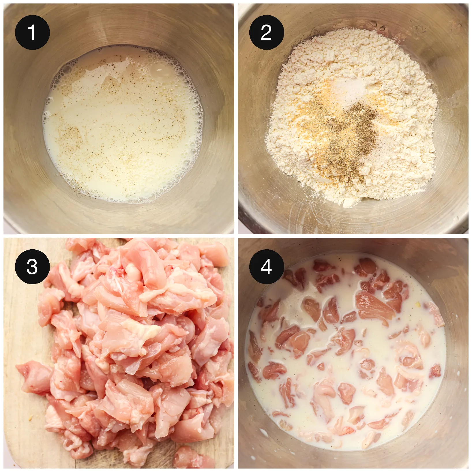 Diced raw chicken soaking in seasoned milk beside a bowl of flour and spices