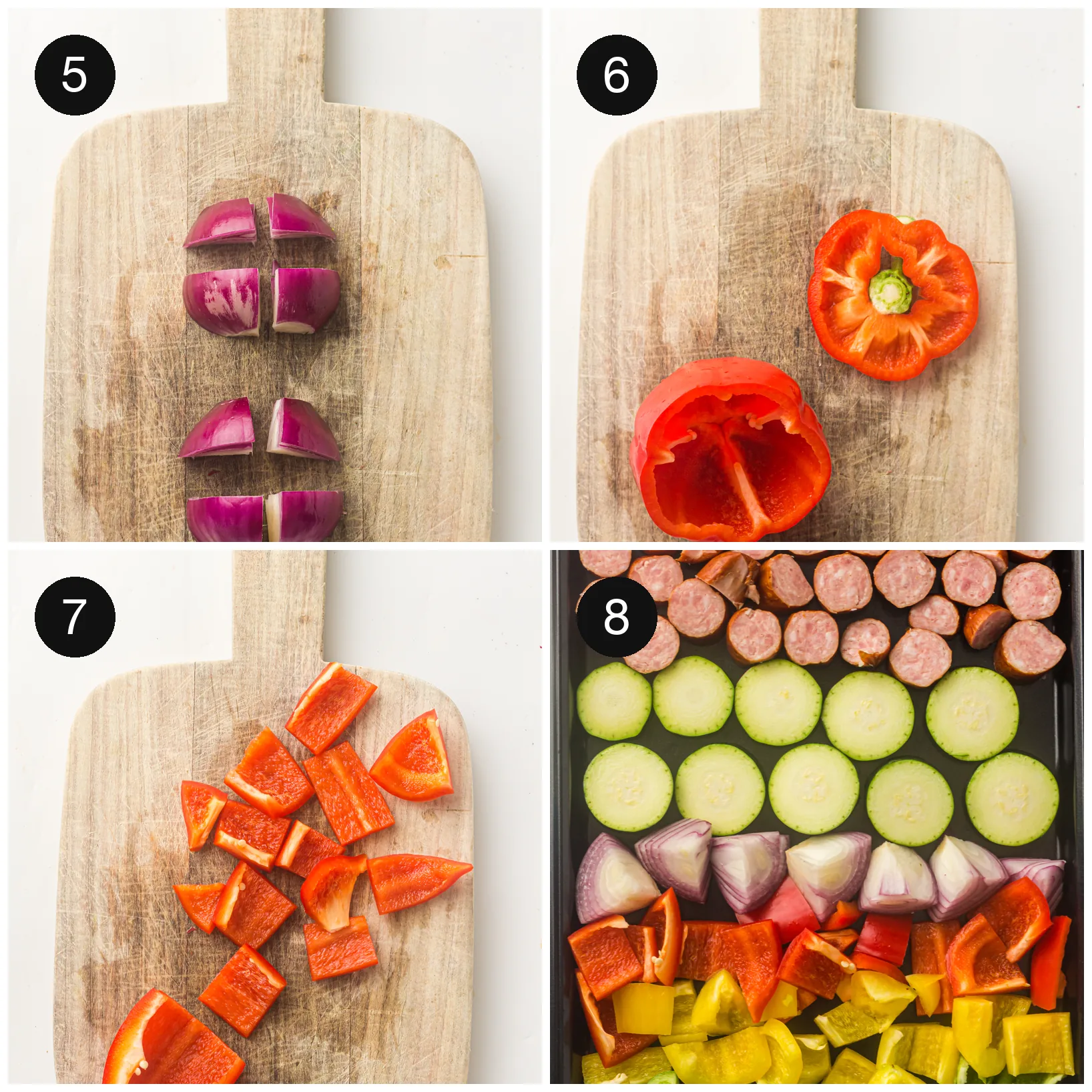 Chopped peppers and courgette spread across a lined baking tray before roasting