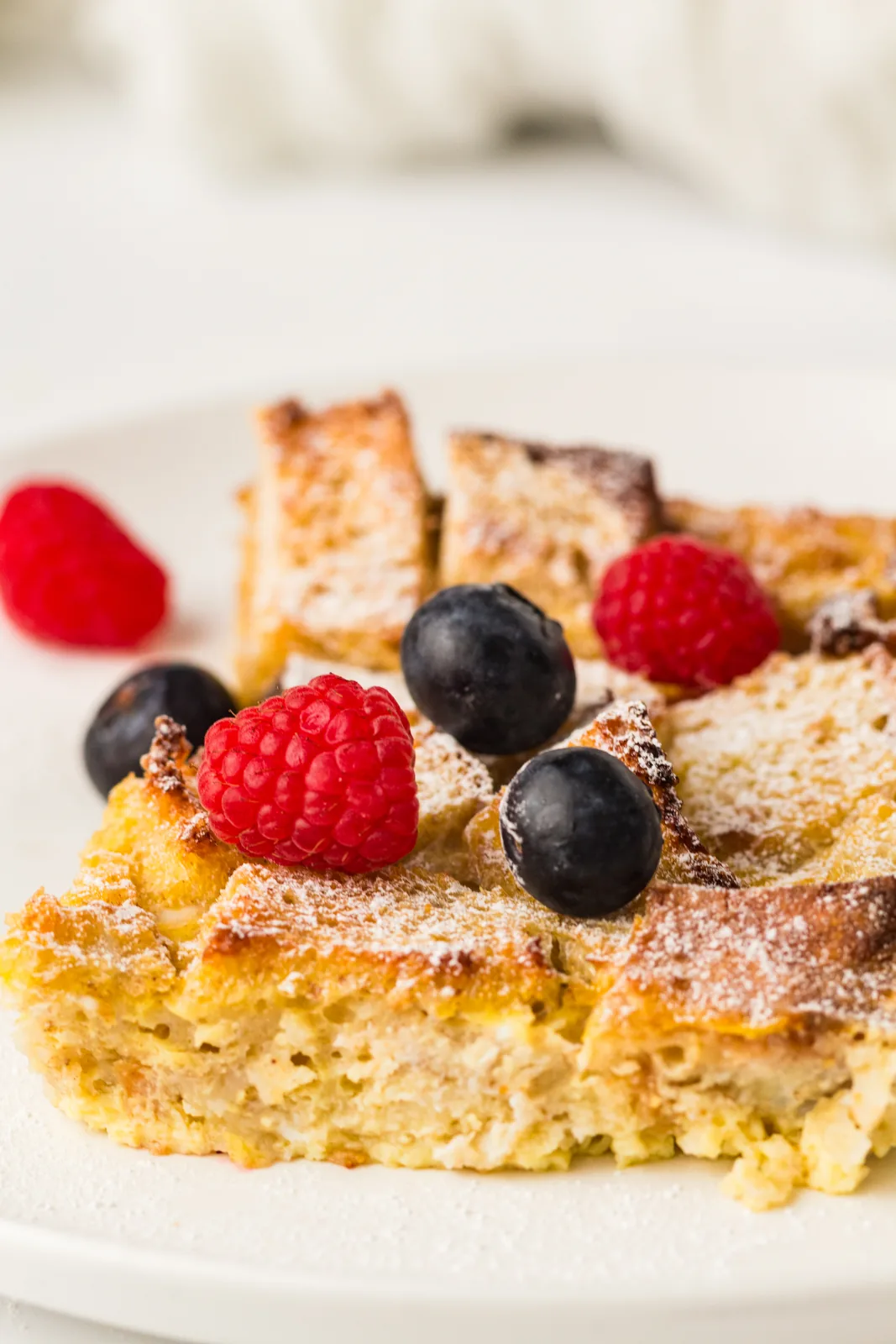 A serving piled with raspberries and blueberries