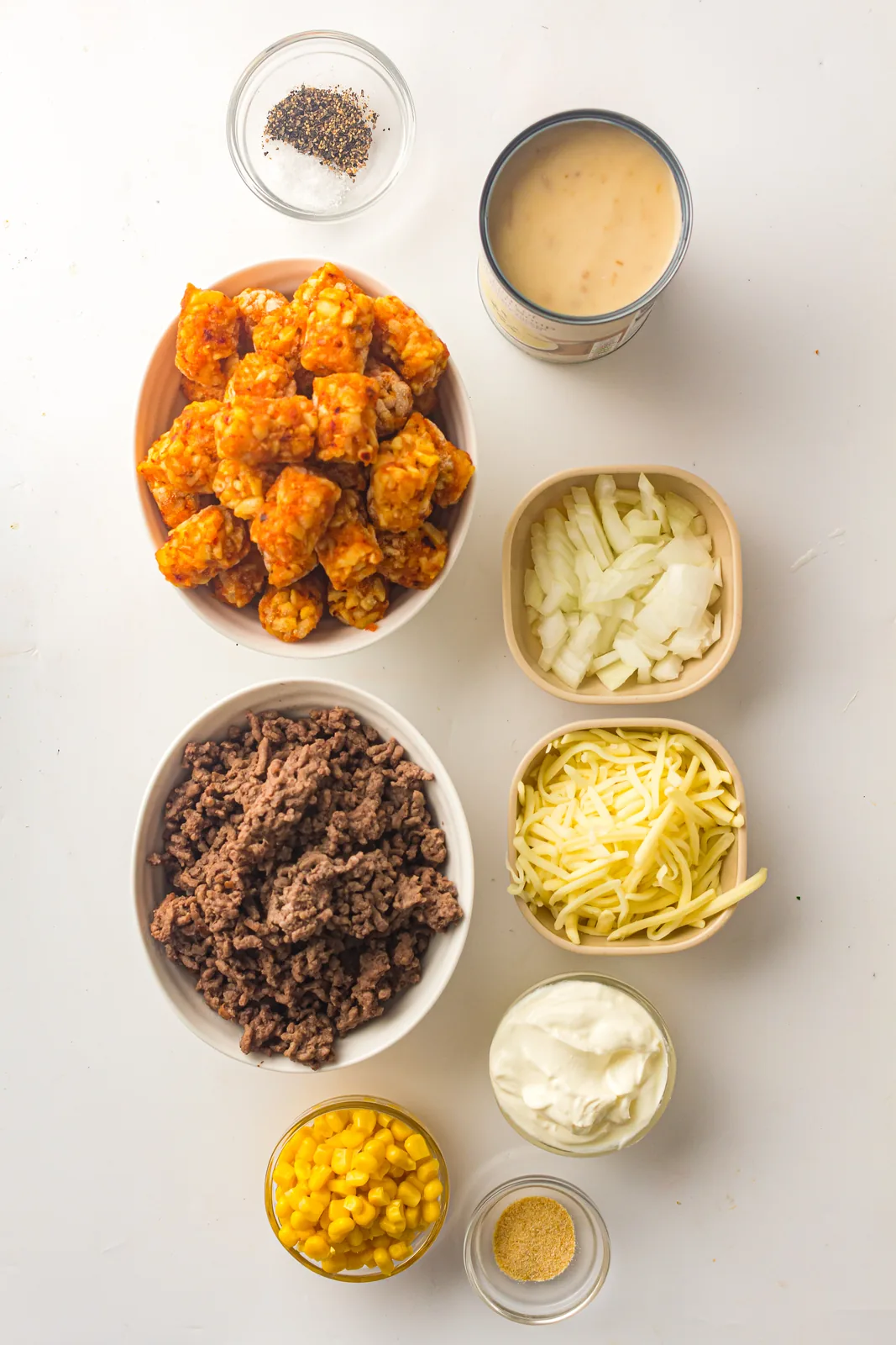 Ingredients for cowboy casserole: mince, sweetcorn, condensed soup, soured cream, cheese and nuggets