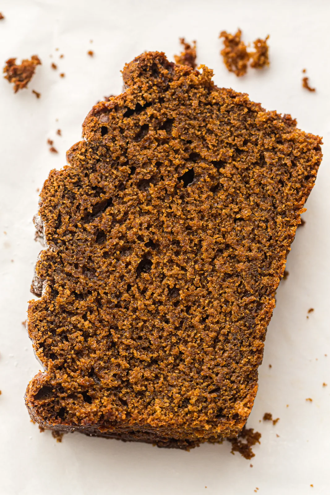 Close up of the dark spiced crumb inside a single slice