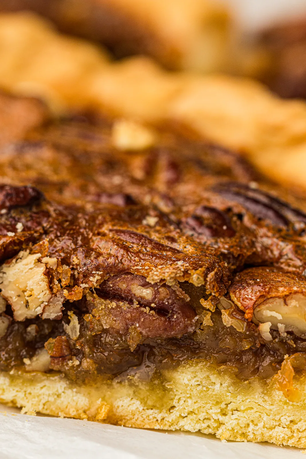 Close up of the glossy nut covered surface after baking