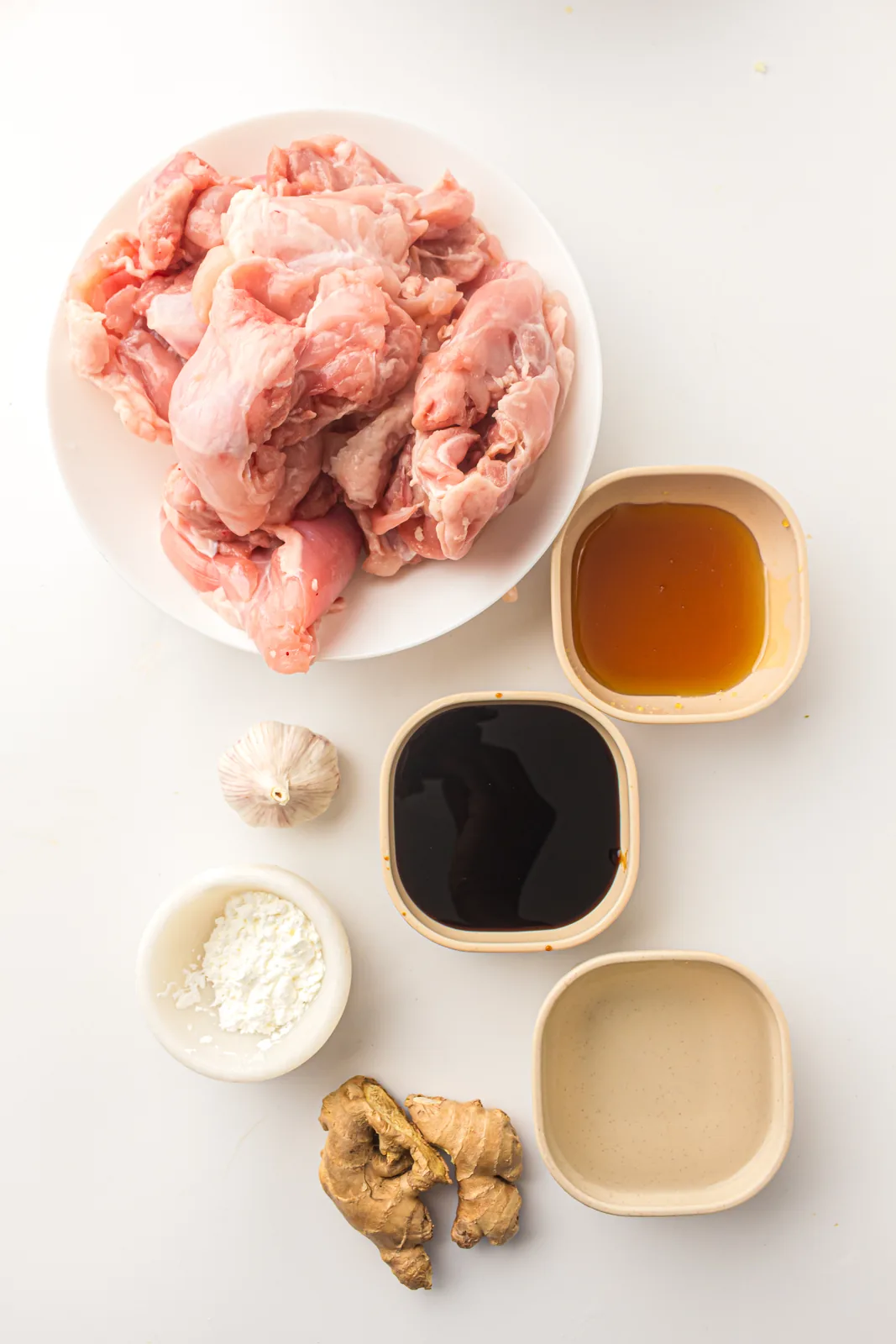 Ingredients for slow cooker teriyaki chicken: diced chicken, soy sauce, honey, garlic, ginger and cornstarch